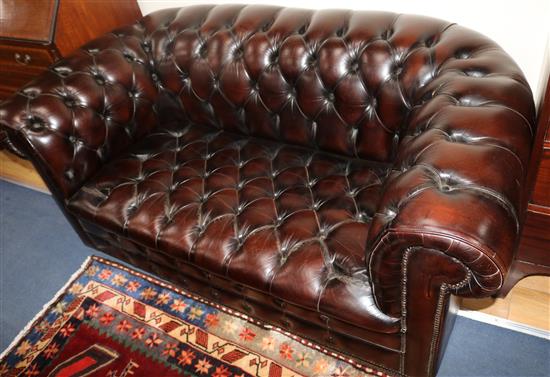 A leather button back two seater Chesterfield, W.160cms